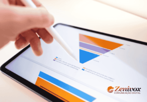 Pessoa usando uma caneta digital para interagir com um gráfico de funil de vendas em um tablet, com o logotipo da Zenivox Comunicação Digital no canto inferior direito. A imagem destaca a importância do monitoramento de dados para otimizar vendas e conversão de leads.
