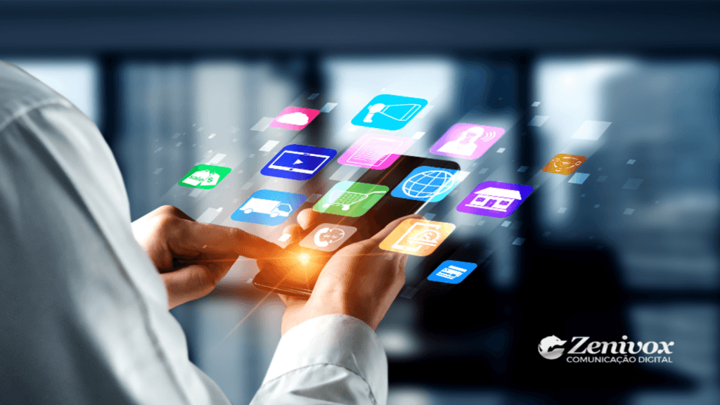 Imagem representando as técnicas de marketing jurídico omnichannel, com ícones flutuantes coloridos de várias ferramentas e plataformas digitais, enquanto uma mão interage com um smartphone. Ao fundo, um ambiente corporativo desfocado transmite modernidade e tecnologia. No canto inferior direito, o logotipo da Zenivox Comunicação Digital é exibido.