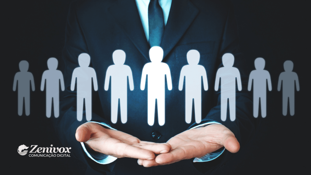 Executivo em terno segurando figuras de pessoas iluminadas em destaque, simbolizando a importância da gestão de tráfego para captar e converter leads qualificados. Logotipo da Zenivox no canto inferior esquerdo da imagem.
