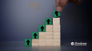 Uma mão posiciona o último bloco verde com uma seta preta apontando para cima, completando uma escada de blocos de madeira. A imagem representa crescimento, progresso e desenvolvimento estratégico, com uma proposta de valor ao cliente. No canto inferior direito, o logotipo da Zenivox Comunicação Digital reforça a identidade da marca.