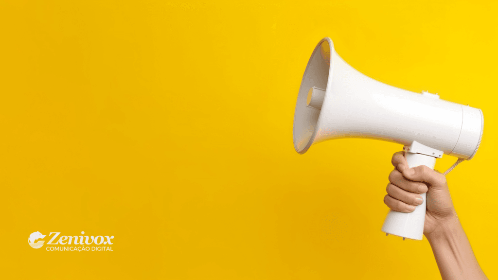Imagem conceitual representando comunicação e persuasão em vendas. Uma mão segura um megafone branco contra um fundo amarelo vibrante, simbolizando a importância de um pitch de vendas. No canto inferior esquerdo, o logo da Zenivox Comunicação Digital reforça a ideia de marketing estratégico.