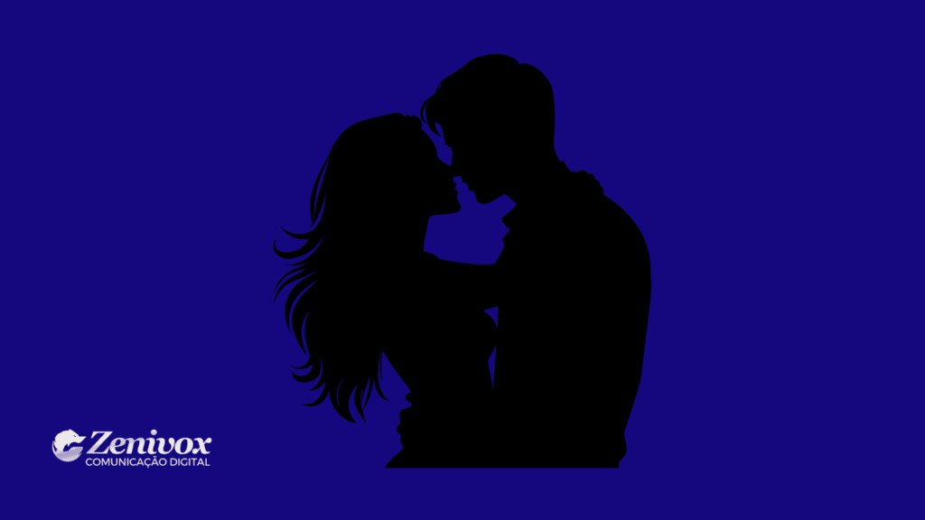Silhueta de um casal em um momento íntimo, prestes a se beijar, representando a personalidade do Amante. A imagem possui um fundo azul profundo, destacando o contraste da figura preta e reforçando a atmosfera de paixão e conexão emocional. No canto inferior esquerdo, o logotipo da Zenivox Comunicação Digital está presente, alinhando a identidade visual à mensagem transmitida.