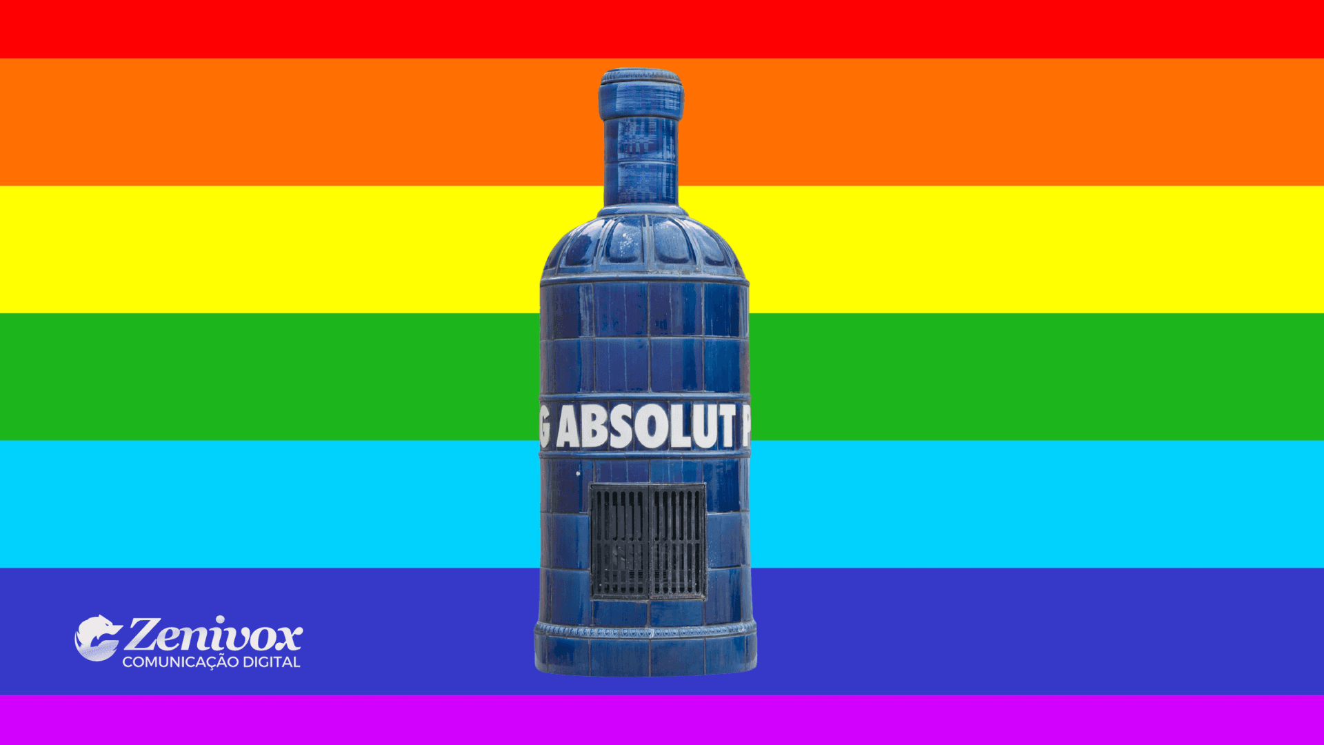 Imagem de uma garrafa gigante estilizada da marca Absolut Vodka, posicionada em frente a uma parede de tijolos vermelhos, destacada com uma sobreposição da bandeira do arco-íris, símbolo do orgulho LGBTQIA+, representando a ousádia do seu buzz marketing. No canto inferior esquerdo, encontra-se o logotipo da Zenivox Comunicação Digital.