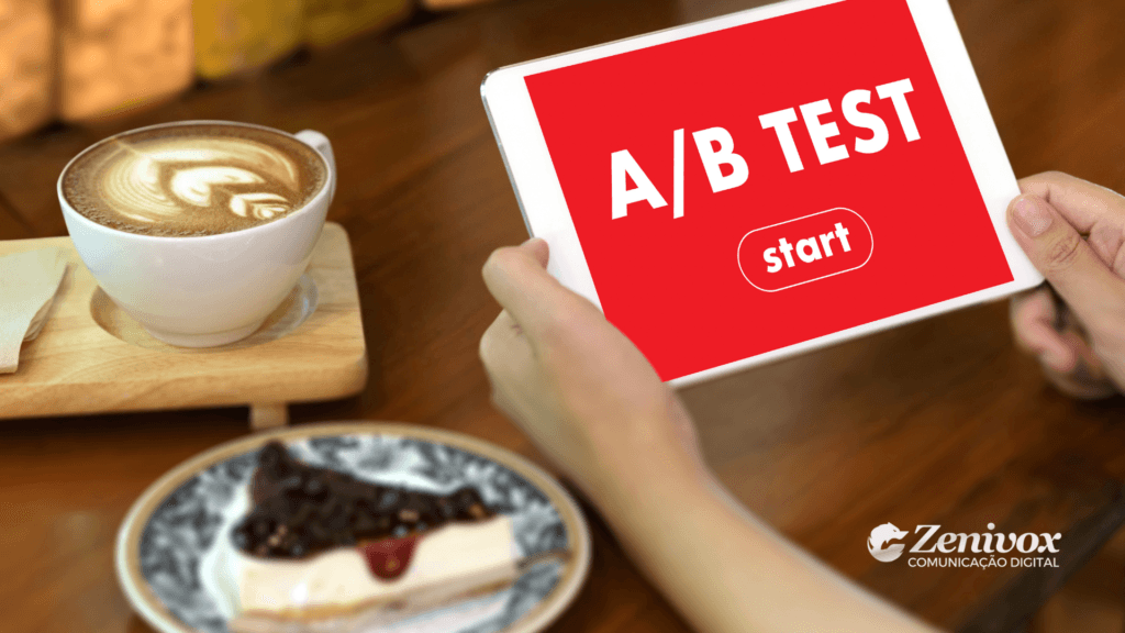 Pessoa segurando um tablet com uma tela vermelha exibindo a mensagem "A/B TEST" e um botão "start". O cenário é uma cafeteria aconchegante, com uma xícara de café com latte art e uma fatia de cheesecake com calda de frutas vermelhas sobre a mesa. O logotipo da Zenivox Comunicação Digital está no canto inferior direito. A imagem representa a importância dos testes A/B para otimizar campanhas de marketing digital e melhorar a taxa de conversão.