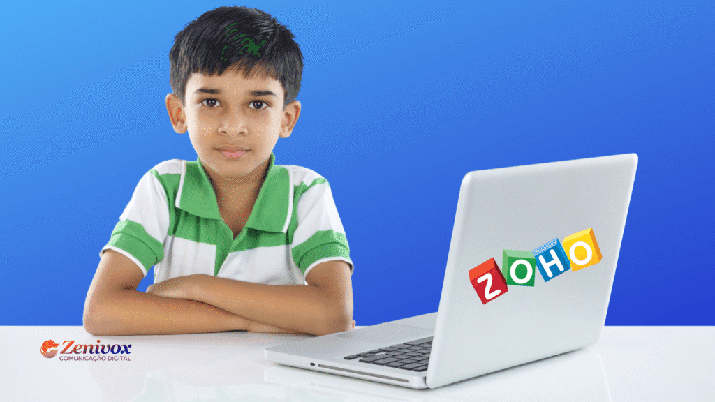 Criança indiana com expressão séria ao lado de um notebook com o logo da Zoho, simbolizando a abordagem inovadora da empresa para formação e recrutamento de pessoas talentosas desde cedo.