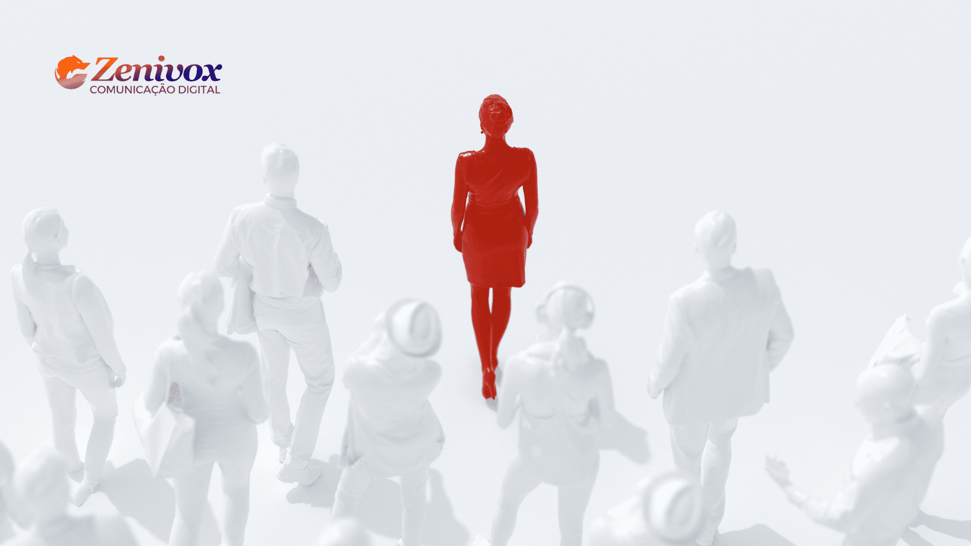 Uma figura feminina em destaque, totalmente vermelha, caminha com confiança entre várias outras figuras brancas, representando a liderança feminina em meio à multidão. No canto superior esquerdo, aparece o logotipo da ZeniVox Comunicação Digital.