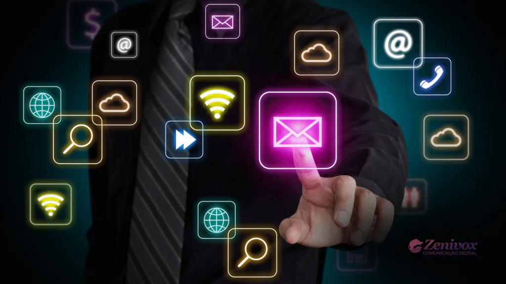 Homem de terno toca um ícone digital rosa de envelope (e-mail), cercado por outros ícones digitais de tecnologia e conectividade como Wi-Fi, nuvem, busca e internet. A imagem transmite a ideia de estratégia e uso de múltiplos canais. No canto inferior direito, logotipo da Zenivox Comunicação Digital.