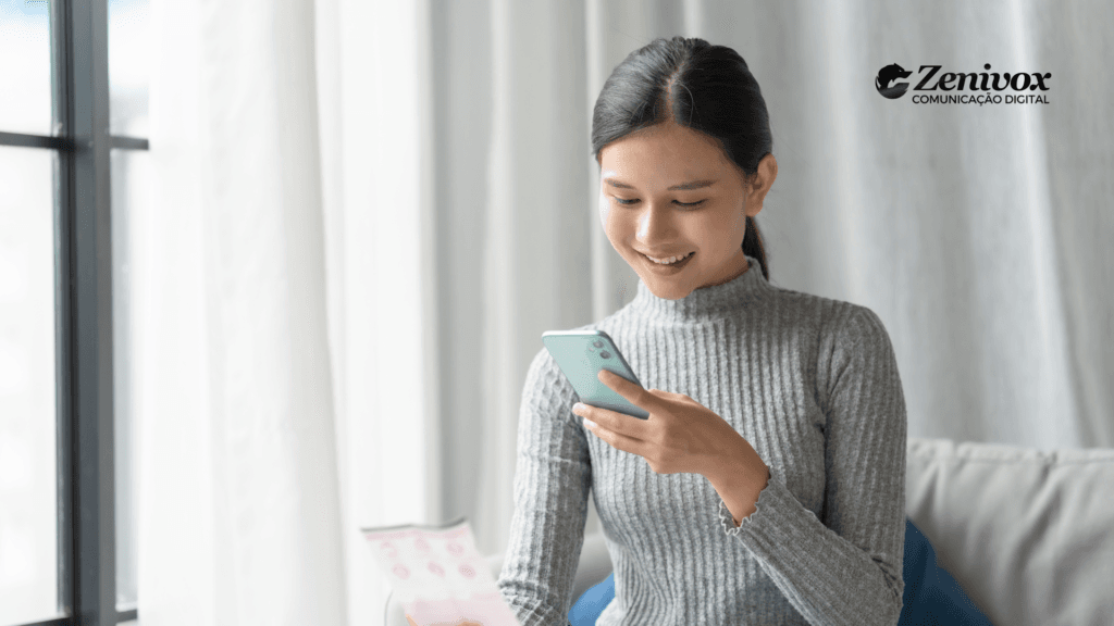 Mulher utilizando o celular para gerar cobrança digital de forma simples e rápida, representando a automação financeira para empresas