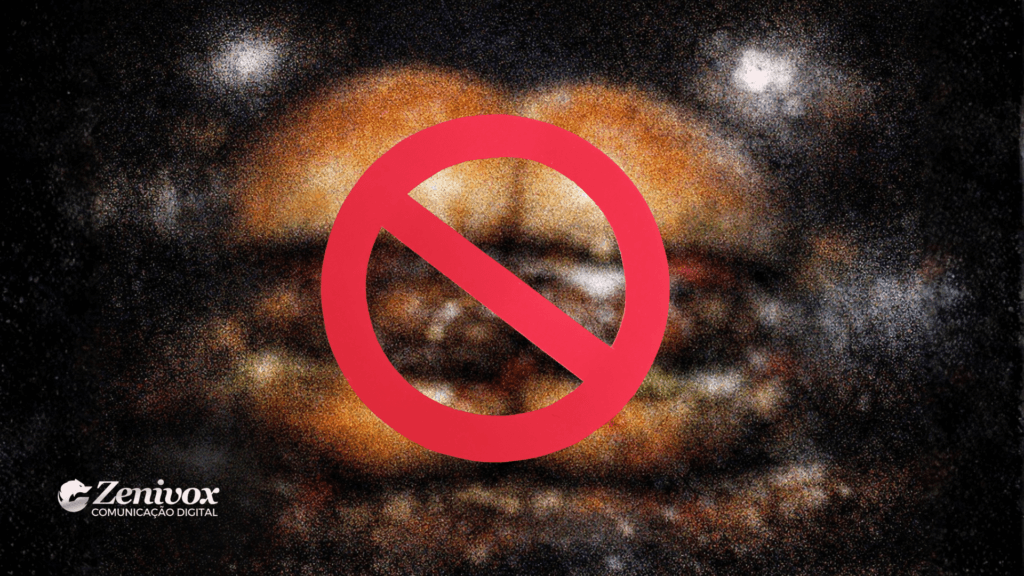 Hambúrguer com aparência sugestiva ao fundo totalmente granulado e distorcido, coberto por símbolo de proibição em destaque, representando propaganda proibida com conotação visual censurada